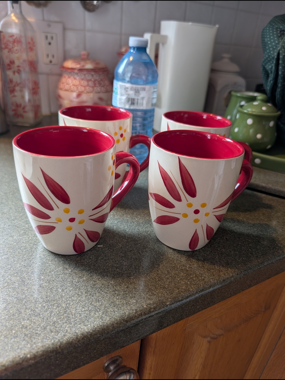 Temptations White Ceramic Mugs with Red Interior and Floral Motif - Set of 4